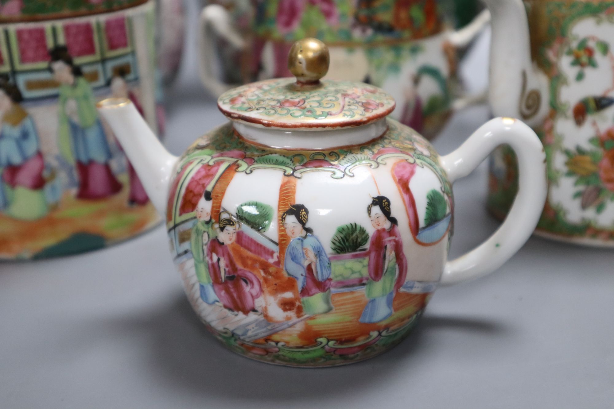 A group of Chinese famille rose tea wares and vases, 18th/19th century, tallest 20cm, (8), damage